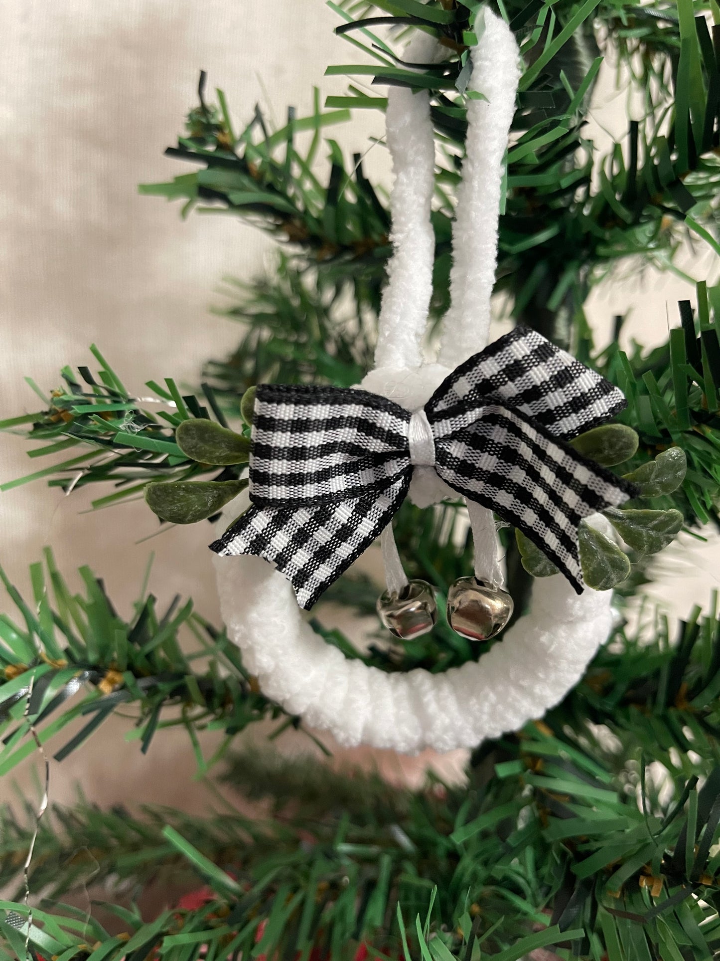 Plush White Yarn Christmas Ornament Wreath w/black and white bow with bells